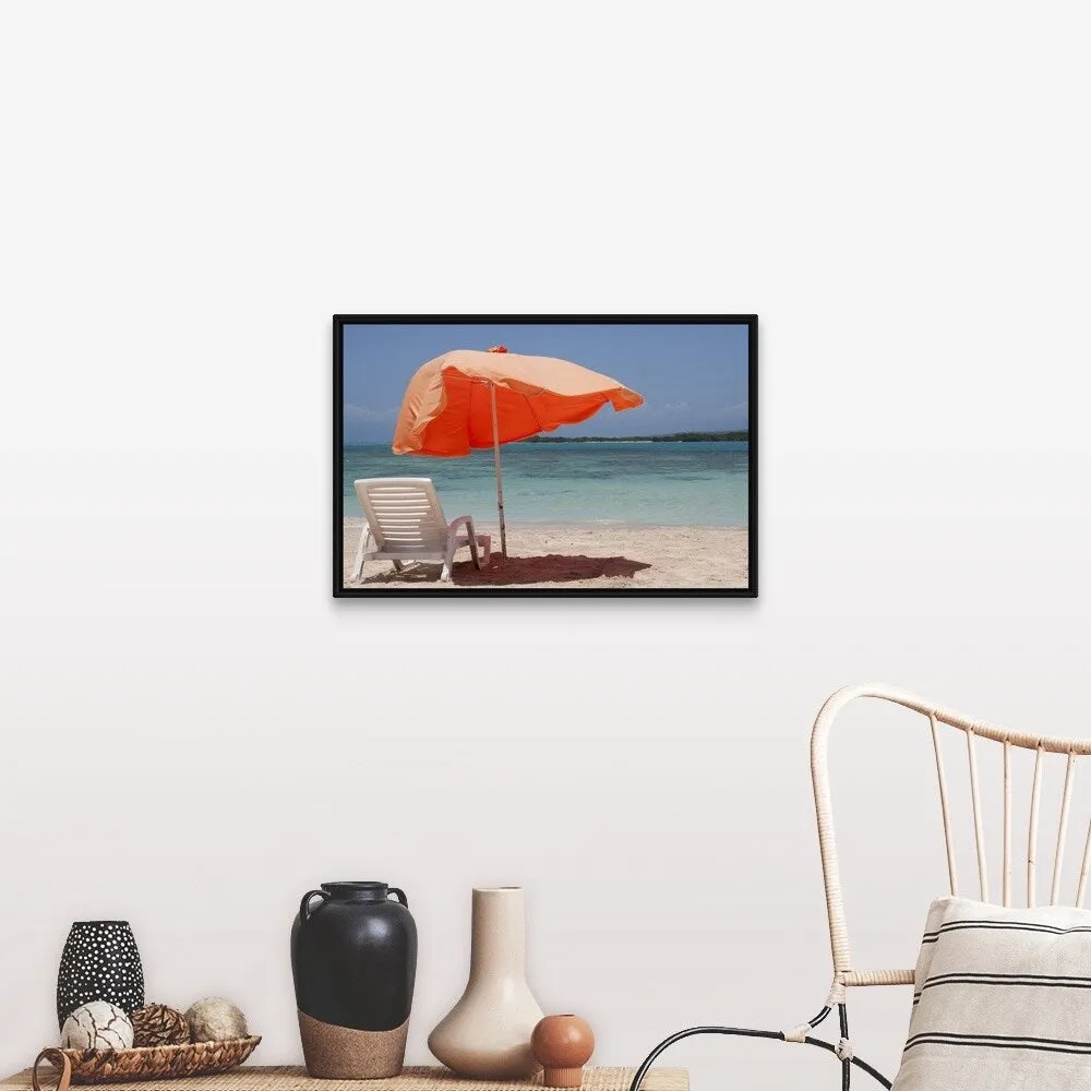 "Chair with parasol umbrella on beach" Black Float Frame Canvas Art