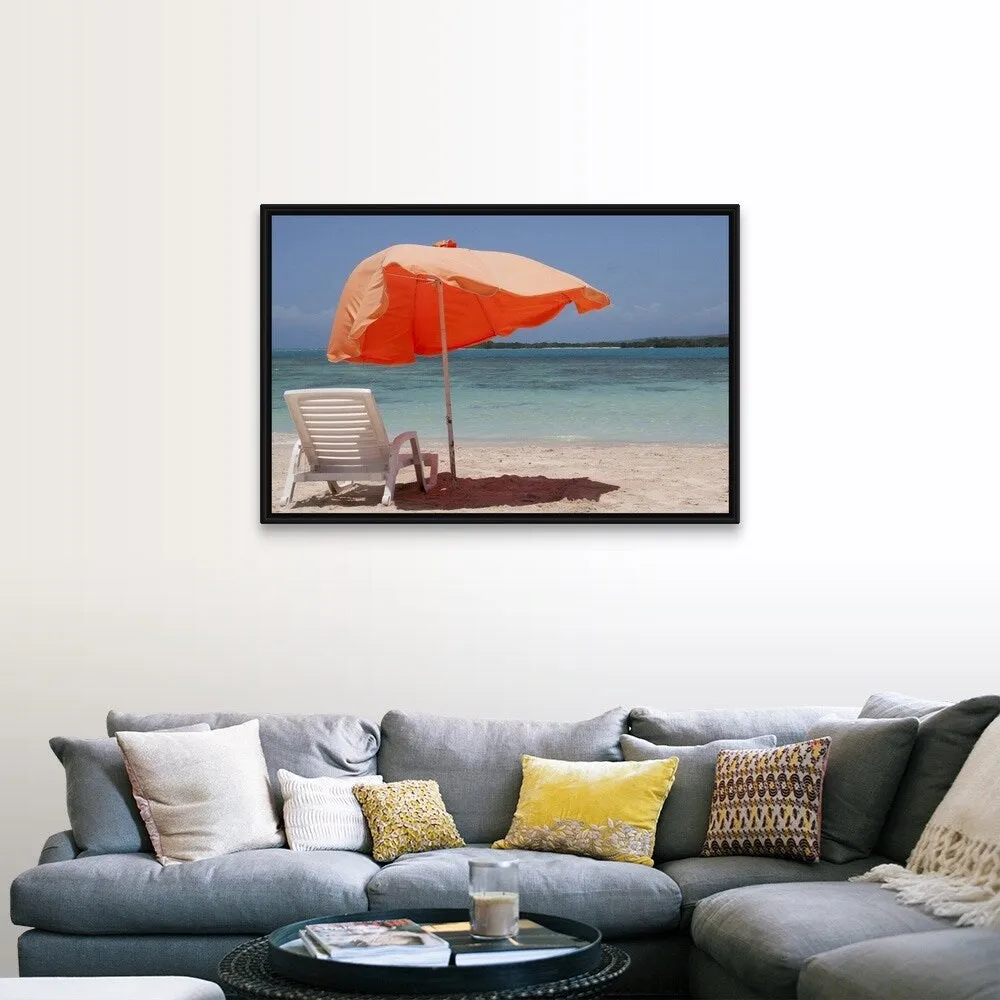 "Chair with parasol umbrella on beach" Black Float Frame Canvas Art